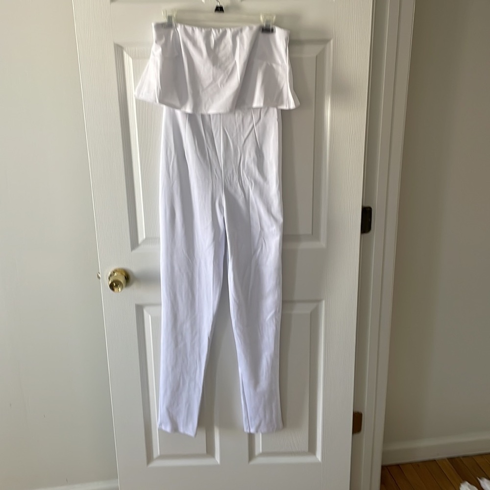 White sleeveless jumpsuit, stretchy material